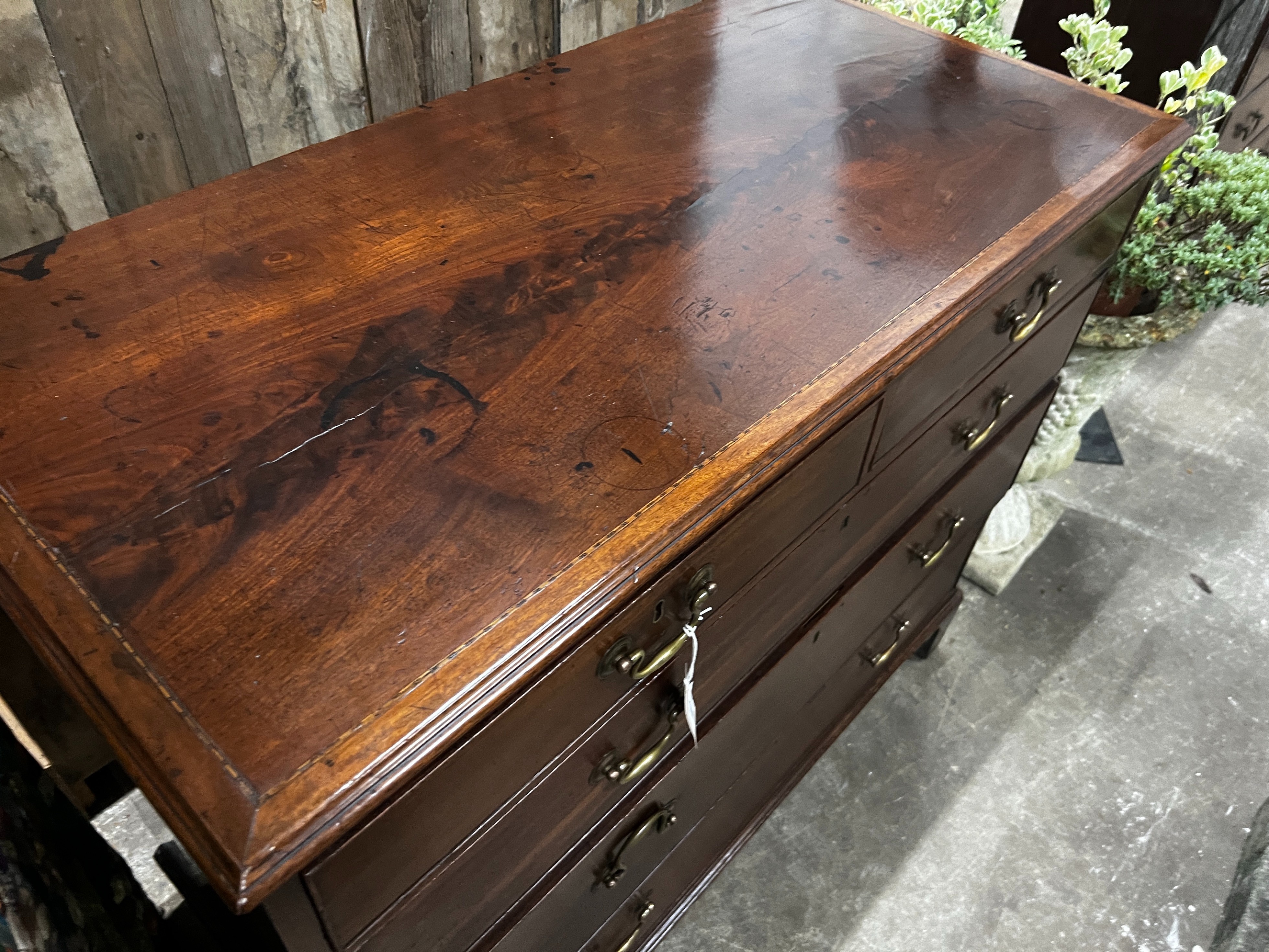 A George III inlaid mahogany chest, width 113cm, depth 55cm, height 98cm